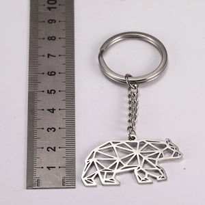 Geometric stainless steel polar bear keychain with scale ruler for size reference