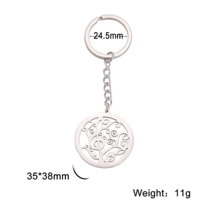 Stainless steel music treble clef keychain with hollow round scrollwork pendant