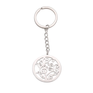 Stainless steel keychain with hollow round musical note pendant and scrollwork patterns