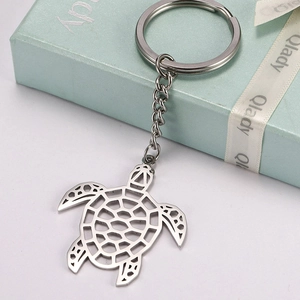 Porte-clés en Acier Inoxydable Tortue Marine Ajourée Géométrique pour Hommes Femmes Pendentif de Sac en Métal Cadeau Moderne