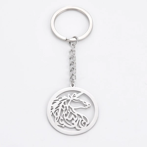 Porte-clés en acier inoxydable avec pendentif licorne creux sur breloque ronde