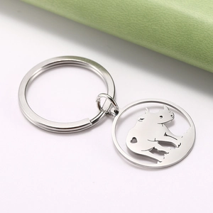 Polished stainless steel rhino silhouette keychain with heart detail and flat key ring