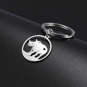 Detailed close-up of a stainless steel rhino keychain with a laser-cut heart detail