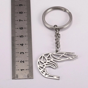 Minimalist stainless steel shrimp keychain with hollow geometric design and key ring