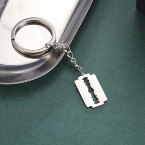 Polished stainless steel razor blade pendant keychain with metal chain and split ring