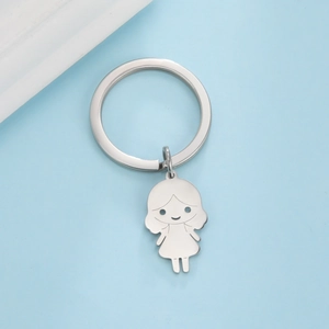 Porte-clés minimaliste en acier inoxydable 304 avec breloque fille mignonne sur bleu