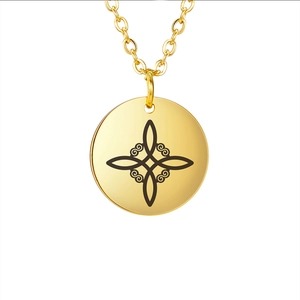 Gold stainless steel necklace with round Celtic witch knot pendant on white background