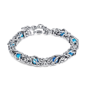 Macro detail of Byzantine chain weave with sky blue cat eye beads and lobster clasp