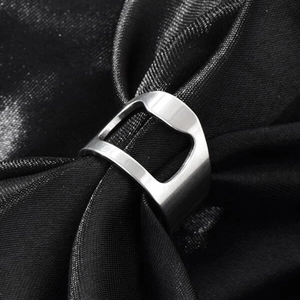 Detailed view of stainless steel bottle opener ring with brushed metal texture