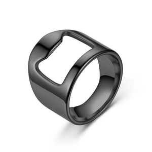 Macro detail of black stainless steel ring with integrated bottle opener function