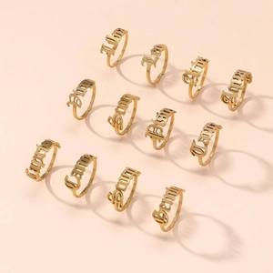 12-piece gold stainless steel zodiac ring set with gothic constellation lettering