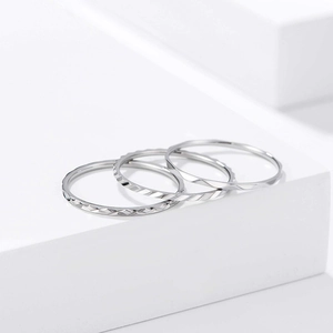 Minimalist silver titanium steel ring set with geometric diamond patterns for women