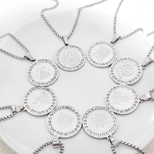 Detailed macro view of eight zodiac Buddha pendant necklaces with sparkling rhinestones