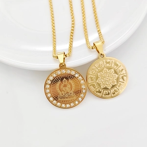 Golden Chinese zodiac and Buddha pendant necklace with sparkling crystals and lotus detail