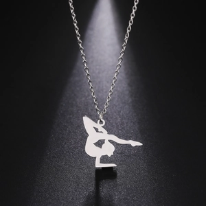 Polished stainless steel gymnast pendant necklace with silver O-chain on black background