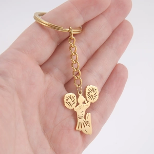 Golden cheerleader silhouette keychain made of polished stainless steel for fans