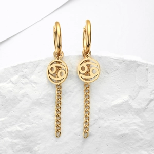 Boucles d'oreilles signe Cancer en acier doré avec pendentif ajouré et pompons chaînes