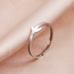 Minimalist silver stainless steel open ring with a crescent moon bird design on pink silk