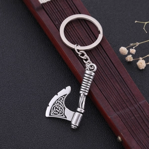 Vintage silver ax keychain with Celtic knot engravings and a sturdy alloy key ring
