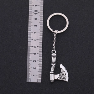 Vintage silver Viking axe keychain with Celtic knot detailing and metric ruler scale