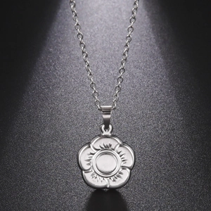 Minimalist 304 stainless steel necklace featuring a polished silver five-petal flower pendant
