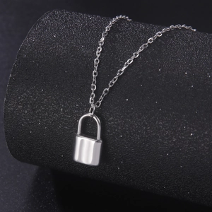 Elegant stainless steel necklace with a polished padlock pendant on a classic O-link chain