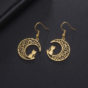 Golden titanium steel earrings featuring a crescent moon and cat silhouette pendant design