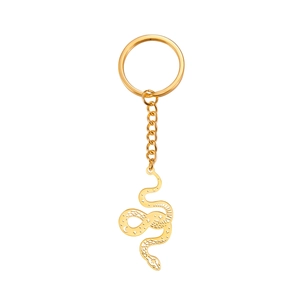 Gold hollow snake pendant keychain with moon and star patterns on polished stainless steel