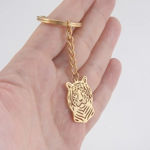 Porte-clés en acier inoxydable doré avec pendentif tête de lion évidé de style punk