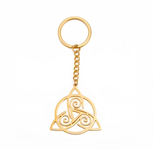 Polished gold stainless steel Celtic knot pendant keychain on a plain white background
