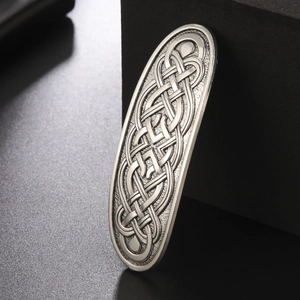 Vintage silver Celtic knot hair clip with intricate relief textures for women