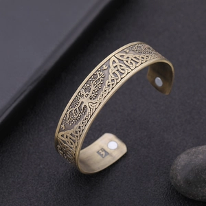 Detailed relief of the Tree of Life and Celtic Knot on a bronze magnetic open bangle