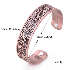 Detailed macro view showing the 13mm width and inner magnets of the Celtic knot cuff bracelet