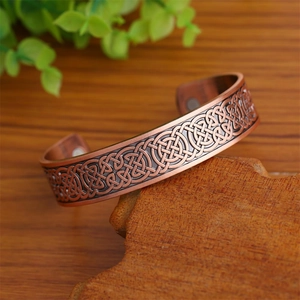 Bracciale per magnetoterapia in rame con motivo a nodo celtico in rilievo vintage