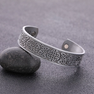 Vintage punk lucky knot open bangle with owl motif and magnetic therapy in aged silver