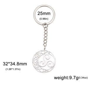 Stainless steel Celtic Knot keychain with Triskele and Moon charms on white background