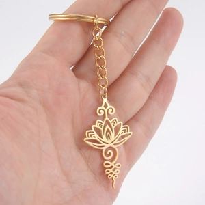 Porte-clés doré en acier inoxydable avec symbole de lotus et unalome évidé