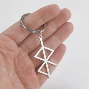 Minimalist geometric stainless steel keychain featuring a modern runic aesthetic design