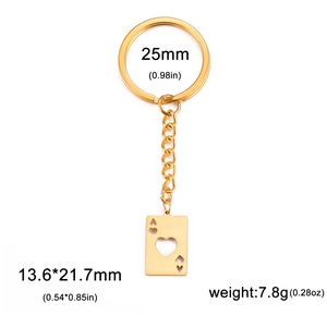 Macro shot of gold hollow heart ace card pendant with specific size and weight labels