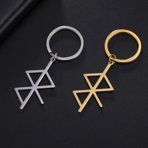 Detailed close-up of gold and silver stainless steel geometric anime pendant keychains
