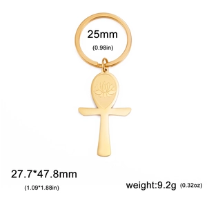 Detailed view of golden stainless steel Ankh keychain with engraved lotus pattern