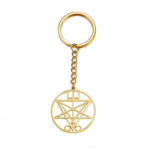 Golden stainless steel keychain with a geometric hollow pendant on white background