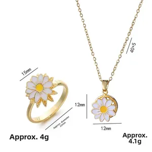Drehbares Gänseblümchen Schmuckset mit weißer Emaille Kette und Ring in Goldoptik