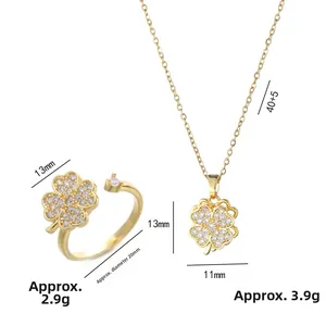 Golden rotating clover necklace and adjustable ring set with sparkling zircons for women