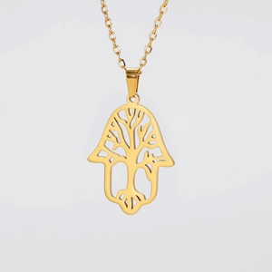 Detail of gold-plated Hamsa and tree of life hollow pendant on stainless steel chain