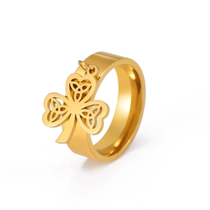 Gold stainless steel wide band ring featuring a hanging Celtic knot shamrock clover pendant