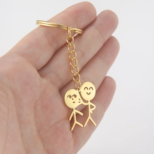 Porte-clés doré en acier inoxydable avec figurines amusantes pour couples et voitures