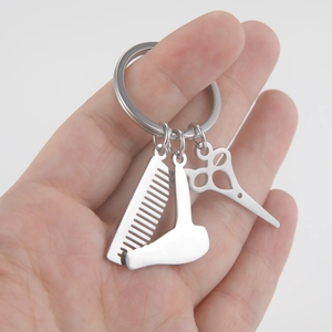Hairdresser keychain with stainless steel comb, scissors, and blow dryer charms