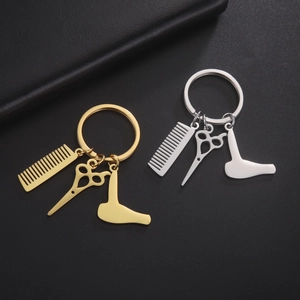 Barber tools keychain with comb scissor and hairdryer charms in gold and silver finish