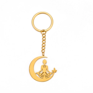 Porte-clés en acier inoxydable doré avec croissant de lune et silhouette de yoga méditation